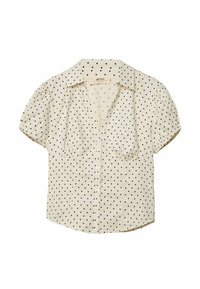 Short-sleeve cream blouse with black polka dots, featuring a button front, collar, puffed sleeves, and gathered detailing under the bust.