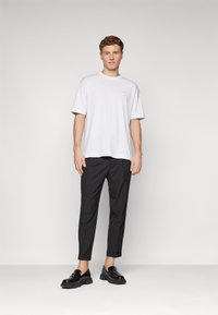 AllSaints DICE TALLIS TROUSER - Hlače - black