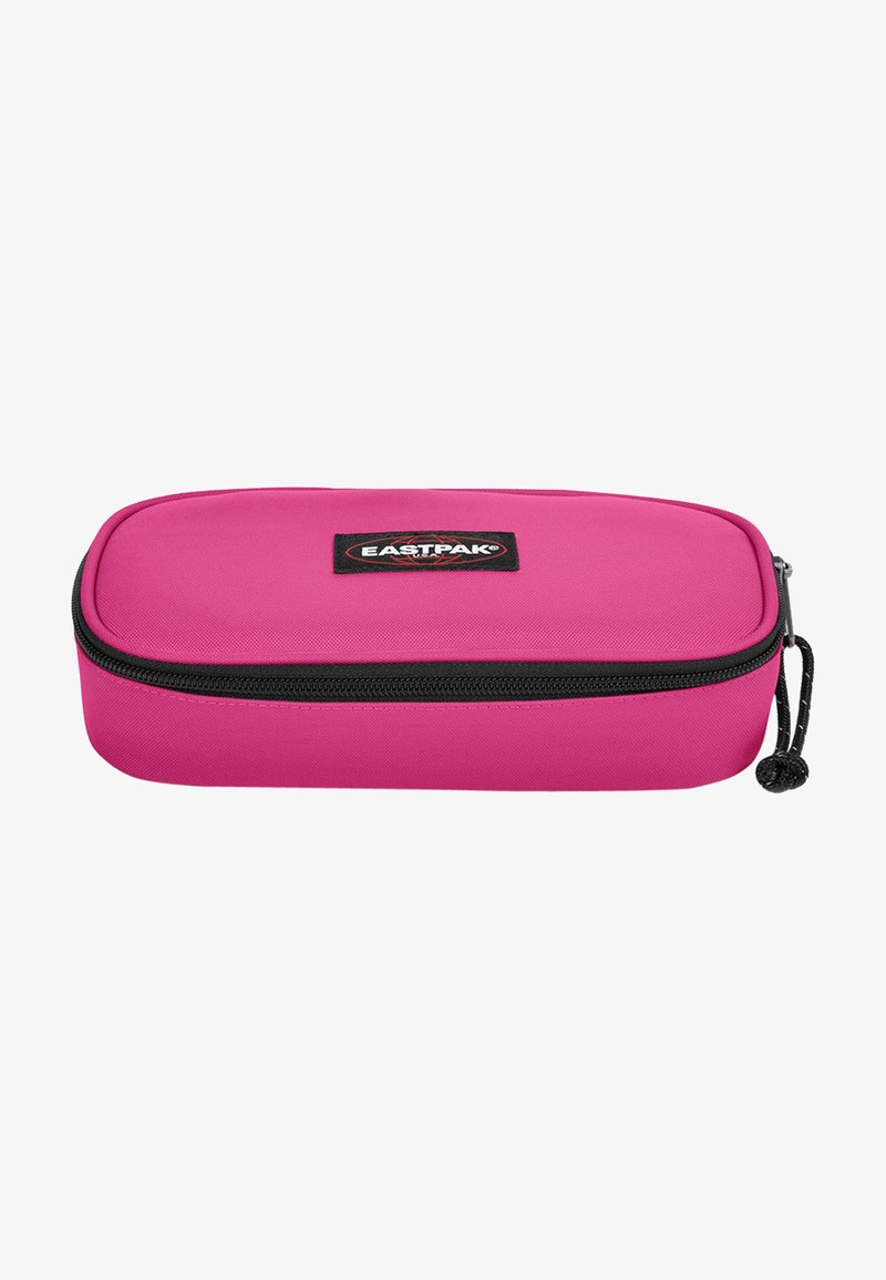 Pink zippered pencil case with a smooth surface, black zipper, and a black Eastpak logo patch on one side. Rectangular shape and durable material.