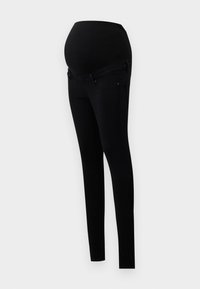 Jeans de maternidad negros con una cinturilla elástica que se ajusta sobre la tripa y piernas de corte slim, con cinco bolsillos y una textura suave y elástica.