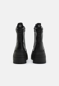Buffalo GOSPHER ZIP BOOT - Botas de tornozelo com plataforma - black