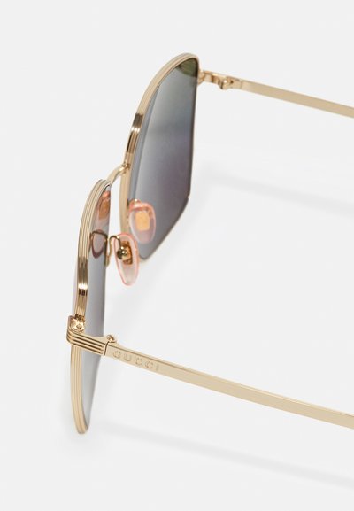 Gucci Akiniai nuo saulės - gold-coloured/multicolor
