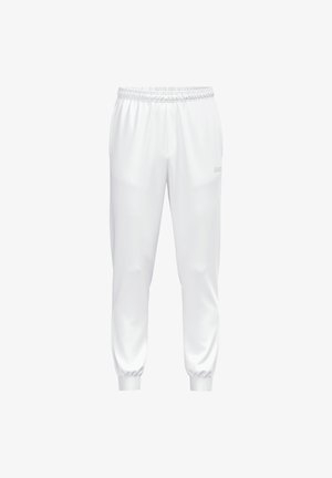 Weiße athletische Jogginghose mit elastischem Bund und Bündchen, seitlichen Taschen und dezentem JAKO-Logo am rechten Oberschenkel.