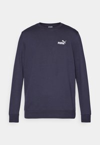 Navy long-sleeve sweatshirt made of cotton. Features a crew neckline, ribbed cuffs, and a white PUMA logo on the chest. Smooth texture.