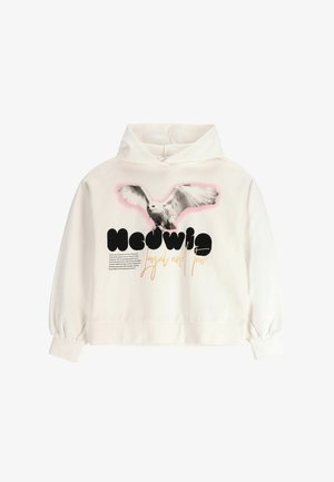 Kremowy hoodie w oversize'owym stylu, z grafiką sowy oraz stylizowanym napisem "Hedwig" nad "loyal and true."