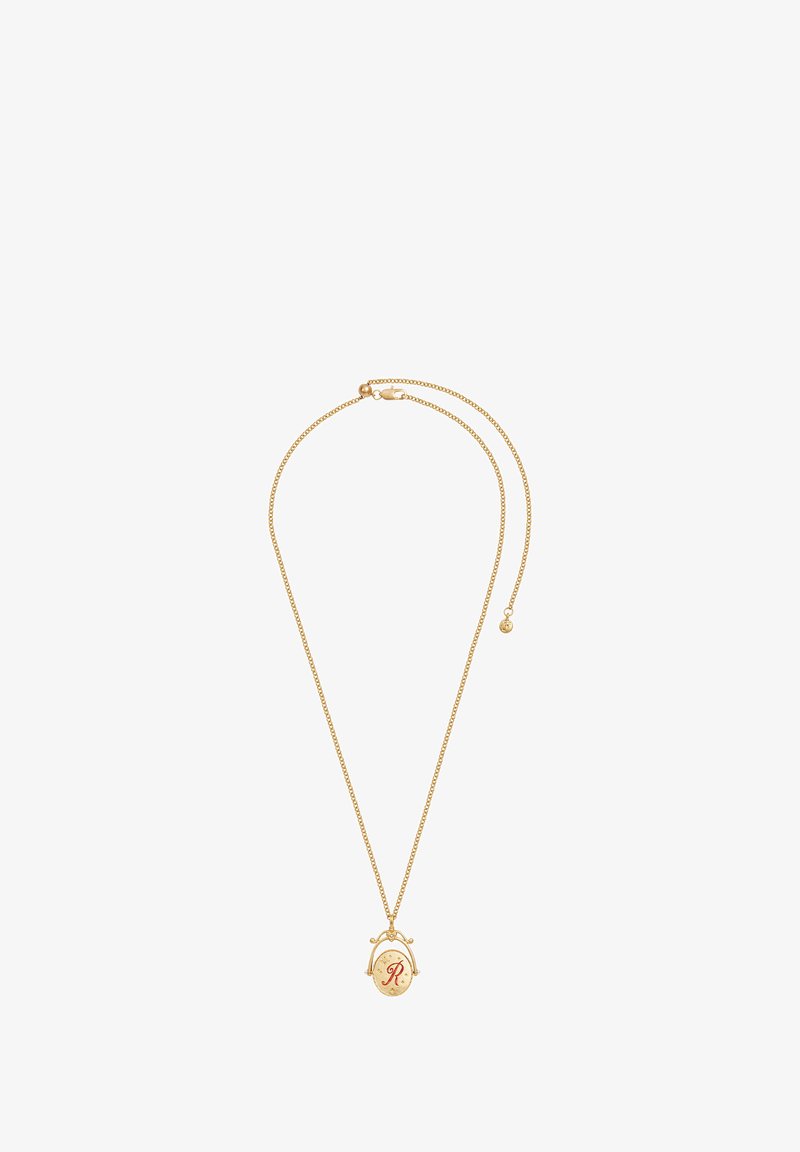 Kullaketiga kaelakee peene kettaga, millel on ovaalne ripats, kaunistatud punase tähega "R" ja dekoratiivsete detailidega.