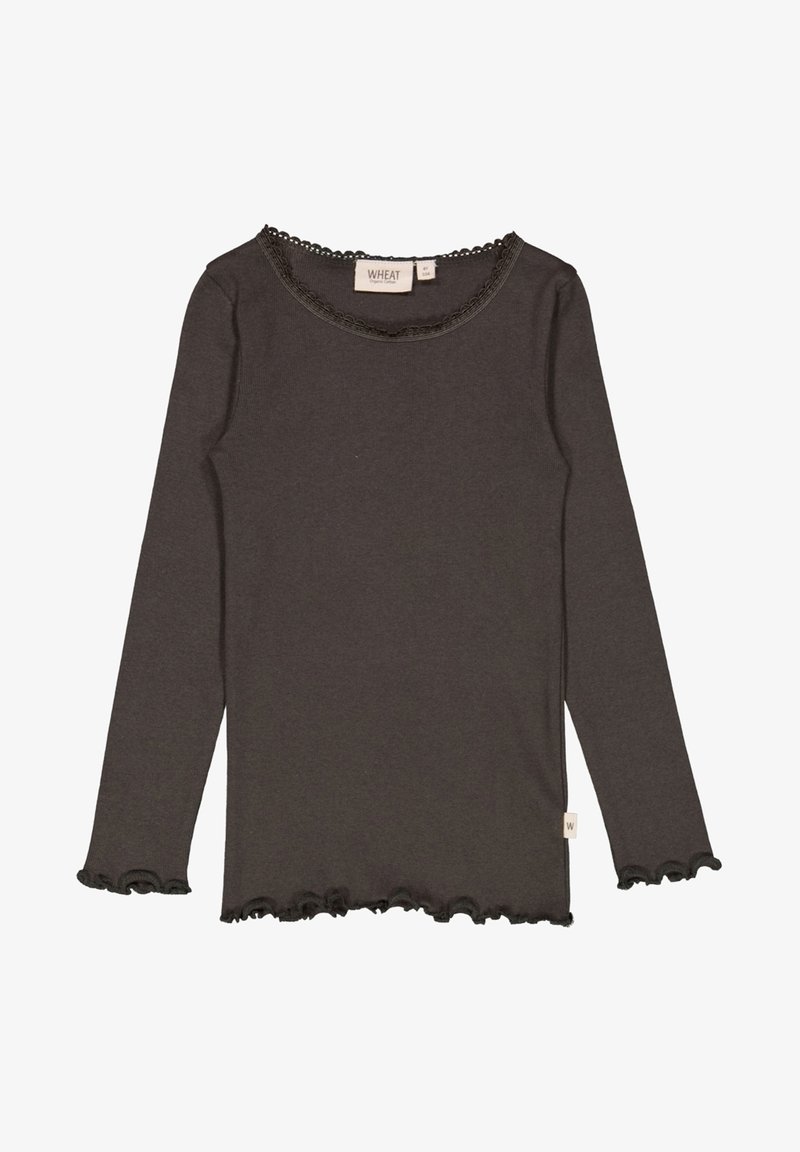 Camisa de manga larga, gris oscuro, hecha de suave algodón con un escote y dobladillo ondulados. Presenta una etiqueta de marca en el lado.