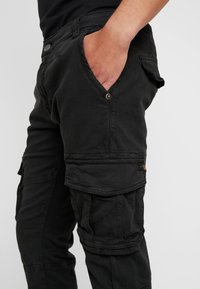 Alpha Industries ARMY PANT - Kapsáče - black