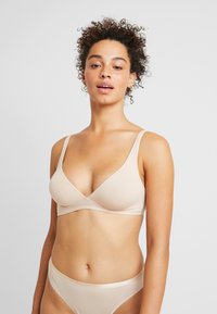 Hanro SENSATION SOFT CUP - Kaarituettomat rintaliivit - skin