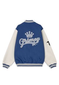 Blauwe en witte honkbaljas met een kroonlogo en de tekst "Grimey" op de achterkant. Ribbelkraag en -mouwen, zachte stof, sportief ontwerp.