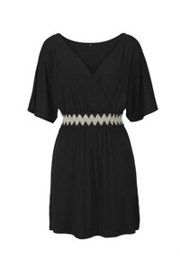 Black short-sleeve wrap dress with V-neck and decorative white zigzag belt at the waist, knee-length hem.