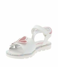 Sandalias blancas con un diseño de mariposa en la parte frontal, con un acento brillante en rosa. Fabricadas en material sintético con una suela texturizada.