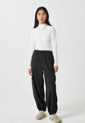 KATES - Cargo trousers - black