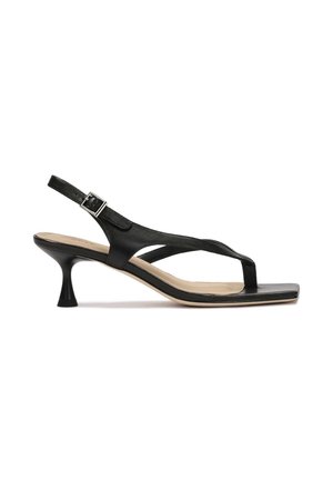 Sort læder slingback-sandal med lav, udfladet hæl, åben tå og krydsede remme. Glat tekstur og minimal detaljer.