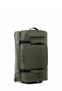 Borsa da viaggio con ruote di colore verde oliva, con esterno in tessuto, cinturini regolabili con fibbia, tasche con zip e base con ruote lisce per la mobilità.