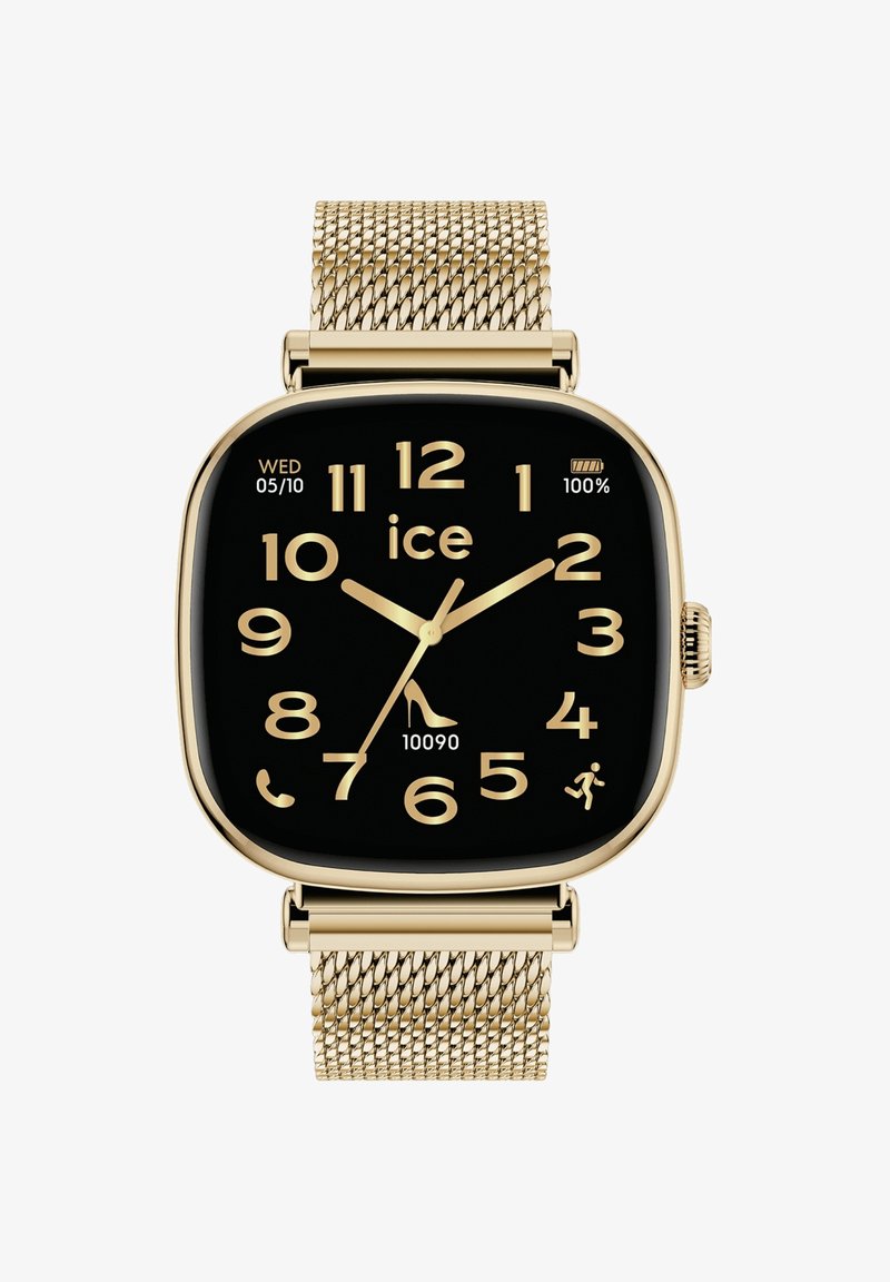 Złoty smartwatch z kwadratową czarną tarczą, dużymi białymi cyframi, metalową siateczkową bransoletą oraz wskaźnikami daty i poziomu naładowania baterii.