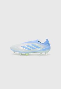 Light blue football boot with a sleek design, featuring a translucent upper, three stripes logo, and conical studs for traction.