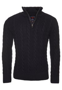 Marinblå kabelstickad tröja med hög krage och halvmatchande dragkedja, med ribbade ärmslut och nederkant, tillverkad av mjukt, texturerat tyg.