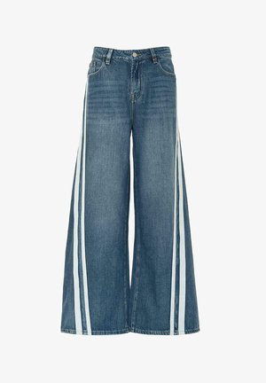 Wijdvallende blauwe denim broek met witte zijstrepen, met een klassieke vijf-pocket ontwerp en een sluiting met een knoop aan de voorkant.