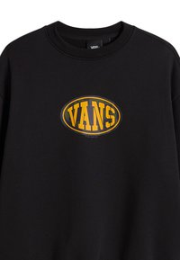 Black crewneck sweatshirt with yellow and black oval Vans logo centered on the chest.