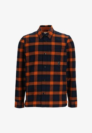 Karierte Hemdbluse mit orangefarbenen und marineblauen Quadraten, langen Ärmeln, einer Brusttasche und schwarzen Druckknöpfen. Aus weichem Stoff gefertigt.