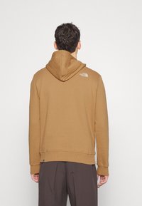 The North Face Jersey con capucha - brown