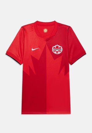 Maglia da calcio Nike rossa con motivo a foglia d'acero di colore rosso scuro, bordo delle maniche nero e emblema del Canada Calcio sul petto.