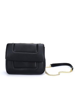 Black leather crossbody bag with padded rectangular design, gold chain strap, and black leather shoulder pad on white background.