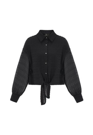 Chemise noire à manches longues avec col, tissu texturé, manches amples, poignets et nœud noué à l'avant à l'ourlet.