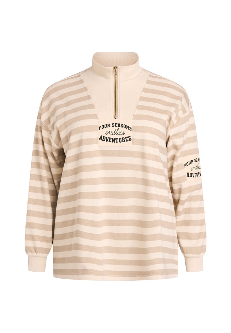 Sudadera de felpa de rayas beige y crema con cuello alto, media cremallera y texto impreso en el frente y las mangas. Textura de tela suave.