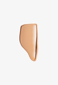 Beige liquid foundation makeup swatch with smooth, slightly glossy texture on white background.