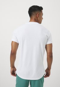 Nike Performance RAFA - Sportovní tričko - white/white/malachite