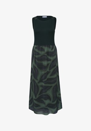 Robe top noire sans manches avec jupe plissée à grand motif de feuilles vertes et noires, avec détails de boucles aux épaules.