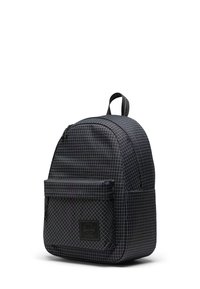 Zaino nero con un motivo a griglia, dotato di una tasca frontale, maniglia superiore e spallacci regolabili. Realizzato in tessuto resistente.