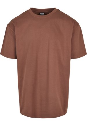 Prosty, brązowy t-shirt z krótkim rękawem i okrągłym dekoltem, luźny krój, z metką Urban Classics wewnątrz tylnego kołnierza.