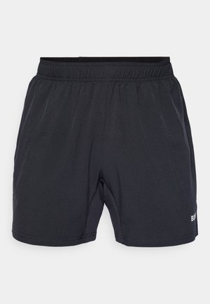 Shorts noirs avec une taille élastique, fabriqués en tissu lisse et léger, portant un petit logo en bas à droite.