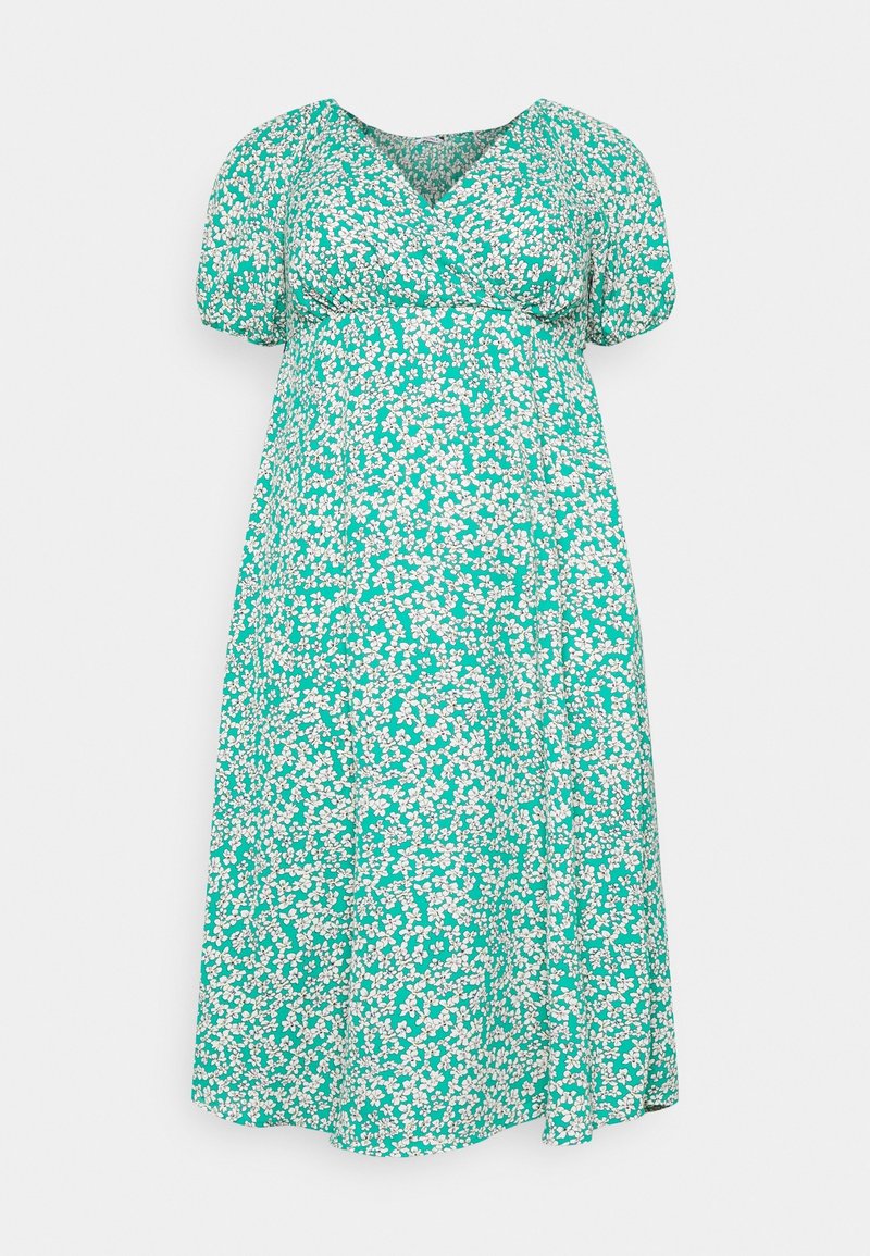 Grünes Blumenkleid mit V-Ausschnitt, kurzen Puffärmeln und lockerer Passform. Mit einem weißen Blumenmuster auf einem strukturierten Stoff.