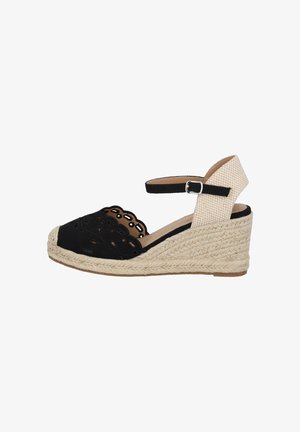 Schwarze Espadrille-Wedge-Sandalette mit ausgeschnittenem Design, ausgestattet mit einer gewebten Jutesohle, einem Knöchelriemen und einem beige strukturierten Absatzakzent.