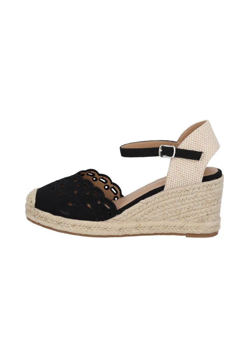 Sandale compensée noire en espadrille avec design découpé, dotée d'une semelle en jute tissée, d'une sangle à la cheville et d'un accent de talon texturé beige.