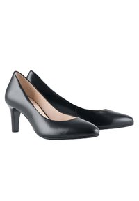Paire d'escarpins pour femmes en cuir noir à talon moyen, avec un bout pointu et une doublure intérieure beige, présentés côte à côte sur un fond blanc.