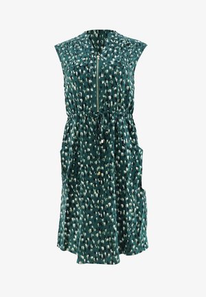Sømløs grøn kjole med lynlås foran, der har et mønster af hvide og mørkegrønne prikker, justerbar talje og sidelommer.