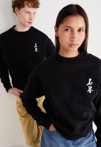 Jack & Jones JORHONOR UNISEX czarny