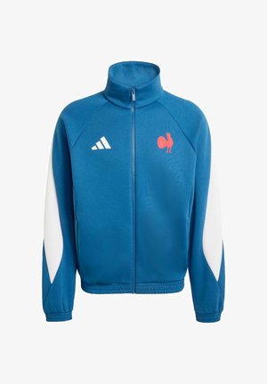 Blaues Sportjackett mit hohem Kragen, weißen Akzenten an den Ärmeln, rotem Hahn-Logo, Reißverschluss und gerippten Bündchen und Saum.