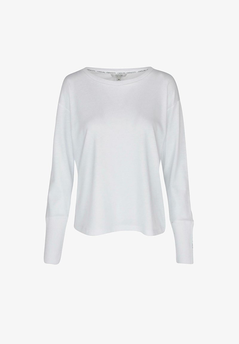 Biała bluzka z długim rękawem, o szerokim dekolcie, z prążkowanymi mankietami i luźnym krojem. Wykonana z miękkiego, lekkiego materiału. Minimalistyczny design.