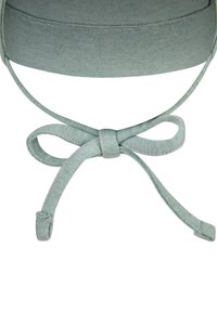 Mint green cotton hat with a wide band and ribbon tie detail. Soft texture with a smooth finish, featuring neat stitching along the edges.