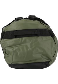 Round green bag made of glossy material, featuring black accents, two adjustable straps, and a smooth texture with a durable base.
