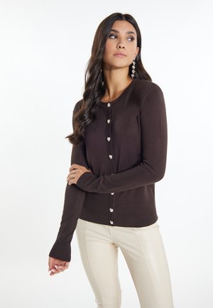 Brown knit cardigan with long sleeves and a round neckline. Features silver-tone buttons down the front and a ribbed hem.