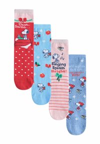 Four pairs of socks: red with white polka dots and Snoopy, light blue with holiday decorations, pink striped with text, and blue with Snoopy illustrations.