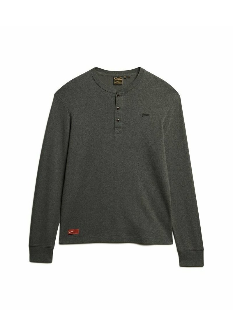 Langärmliges, dunkelgraues Henley-Shirt aus weichem Stoff. Verfügt über eine Knopfleiste, gerippte Bündchen und ein kleines Logo auf der Brust.