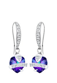 Smykker i sterling sølv i hjerteform, med lilla krystalsten, klare rhinsten og en buet metaldetalje.